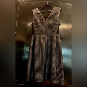 BCBG Maxazria  Black quilted faux leather sleeveless dress